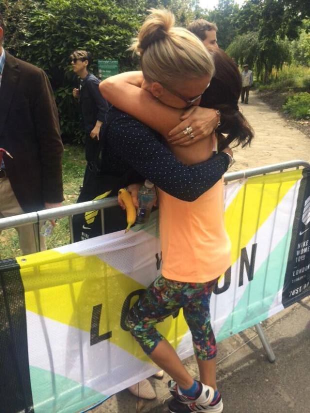 Lisa after the race! Hugging her sister, Gail.