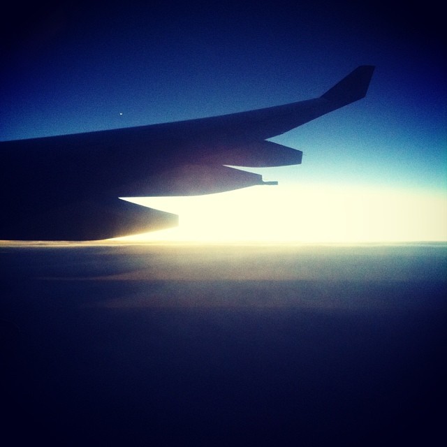 Watching the sun set from a plane is so beautiful. Like you can see the edge of the world. And then the stars start to shine and you can see street lights flicker on below you. Magic.